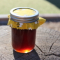 12oz jar - Arizona Desert Dark Honey, Raw and Unfiltered Honey, it looks almost black on the shelf in the jar, but when the sun shines through it or you pour it out you can see it is actually a dark amber, mahogany color.  The flavor is rich and sweet, very delicious.